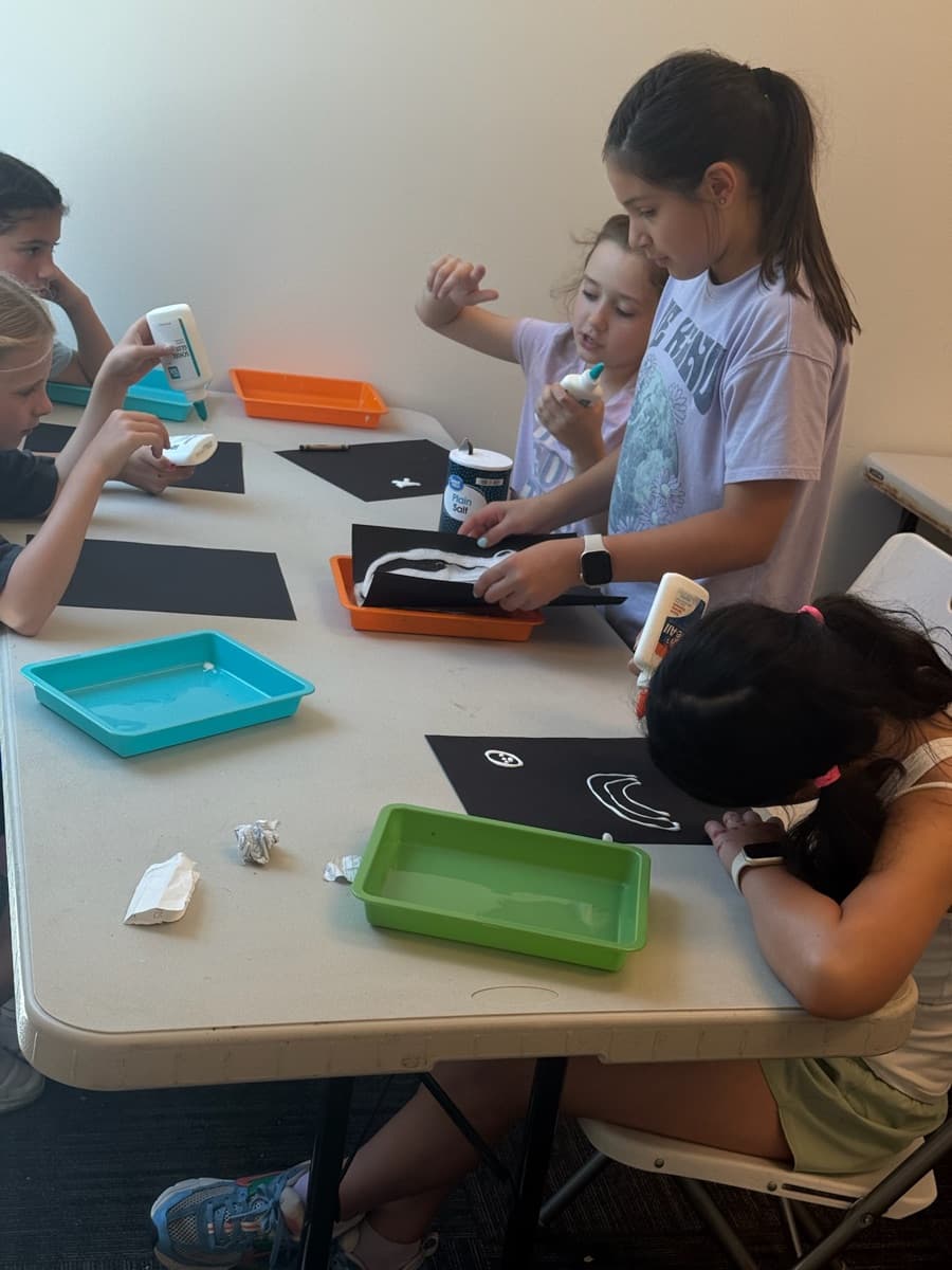 Children in a group activity at the Little Dreamers facility